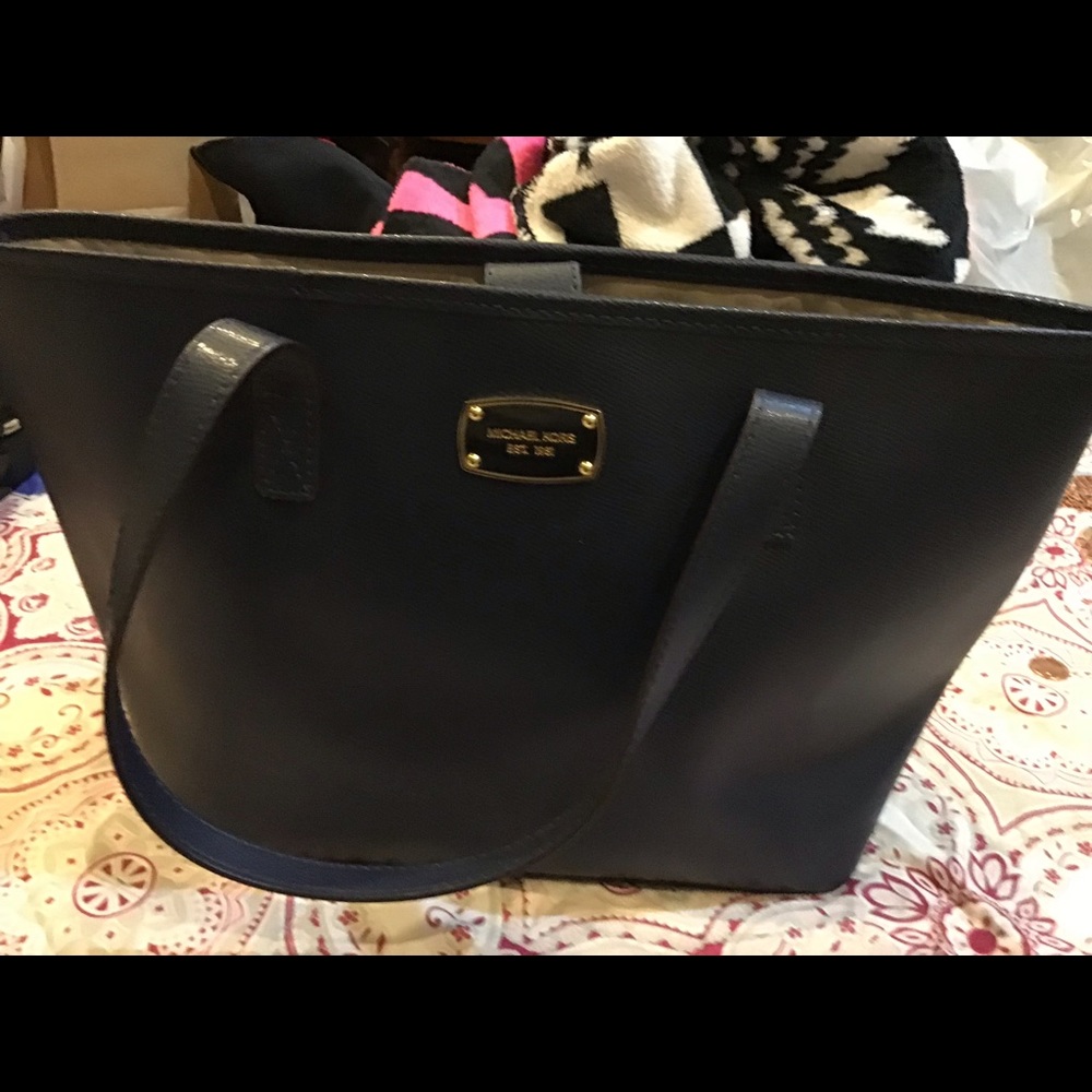 Authentic Michael Kors leather tote.